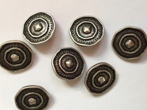 silver coloured buttons